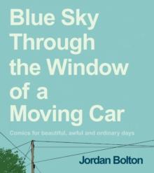 BLUE SKY THROUGH THE WINDOW OF A MOVING CAR